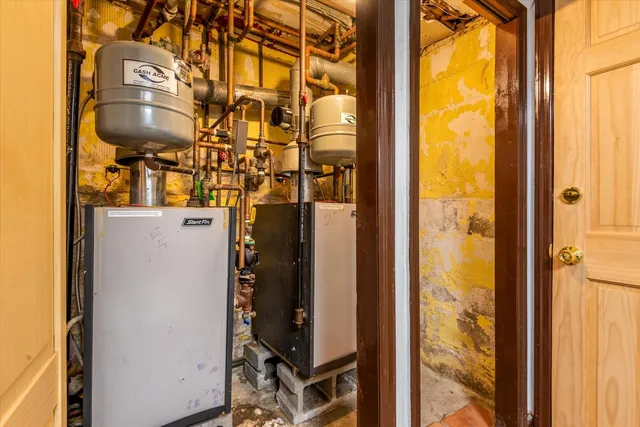 a view of a workspace with furniture and a kitchen