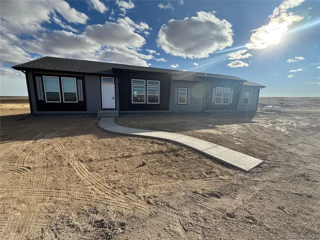 a view of a house with a snow