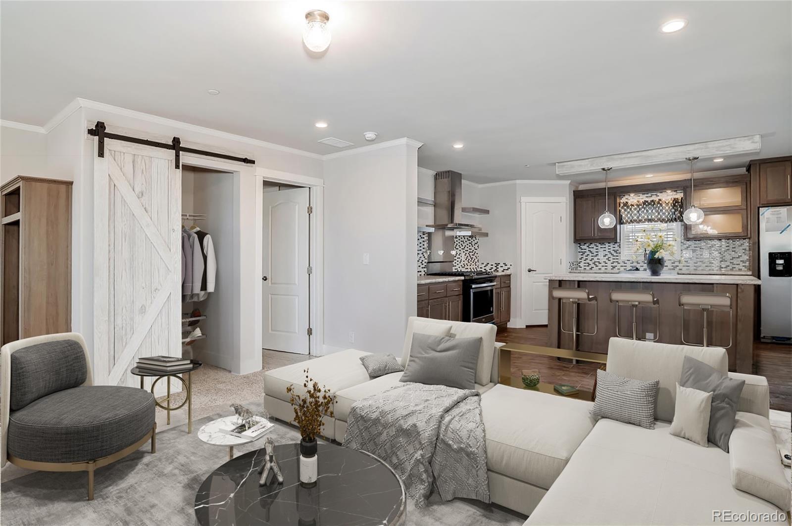 5165 Pass Me By Road Strasburg, CO 80136 - Photo 9 of 24 a living room with furniture and a large window