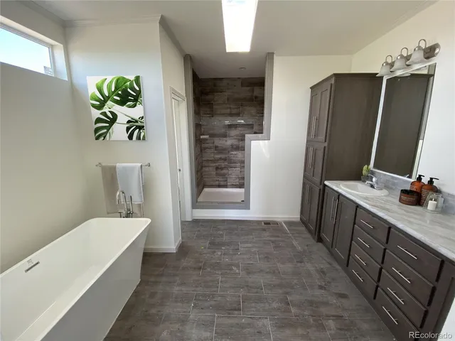 a bathroom with a double vanity sink and mirror