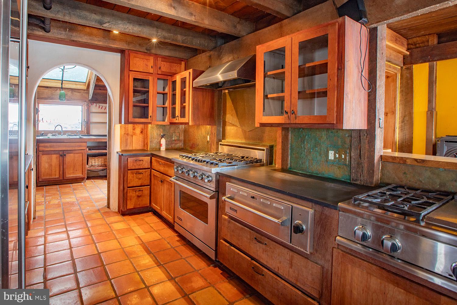 220 Dietrich Road Kempton, PA 19529 - Photo 19 of 90 a kitchen with stainless steel appliances granite countertop a stove and a cabinets