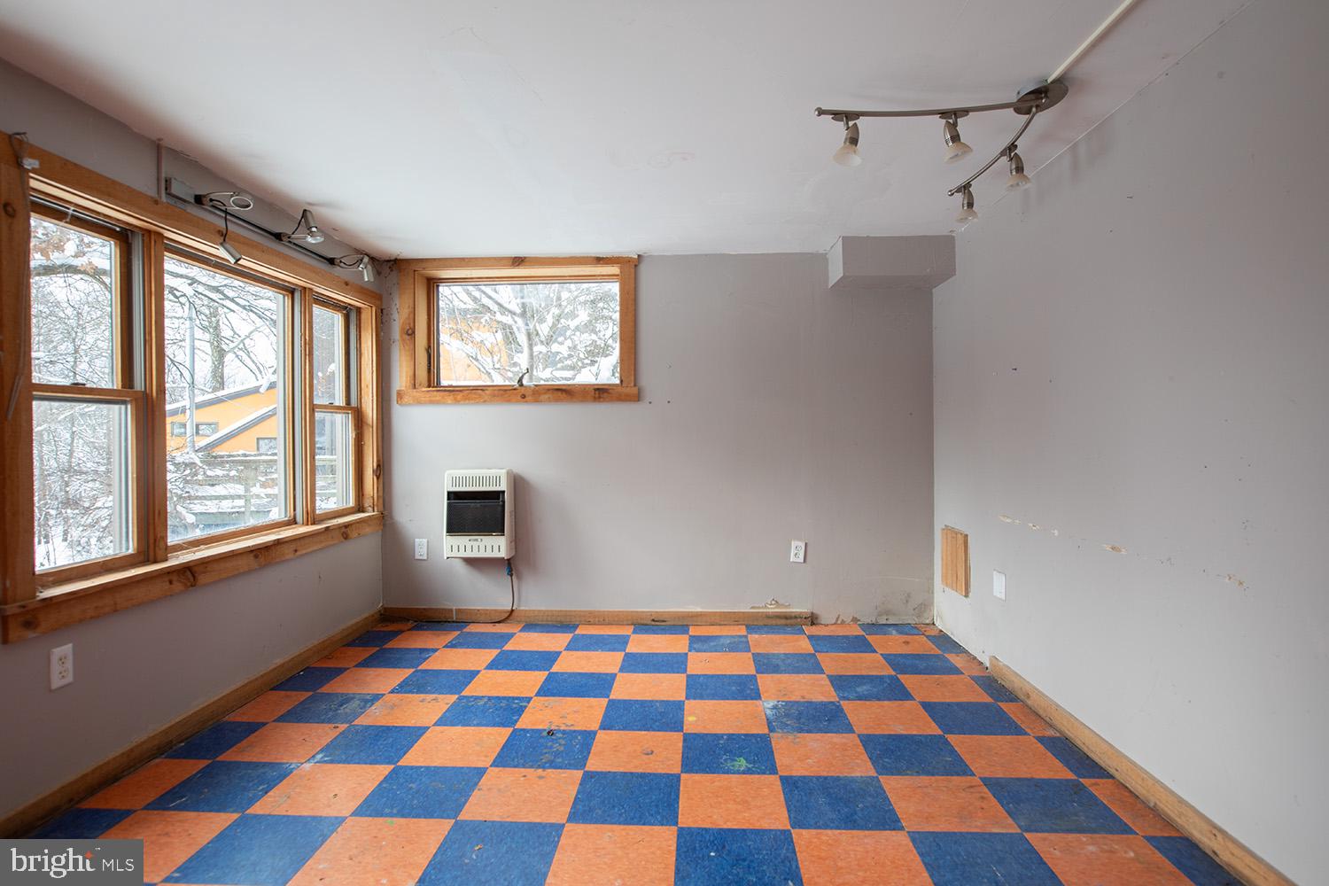 220 Dietrich Road Kempton, PA 19529 - Photo 55 of 90 a view of a bedroom with a black and white checkered floor