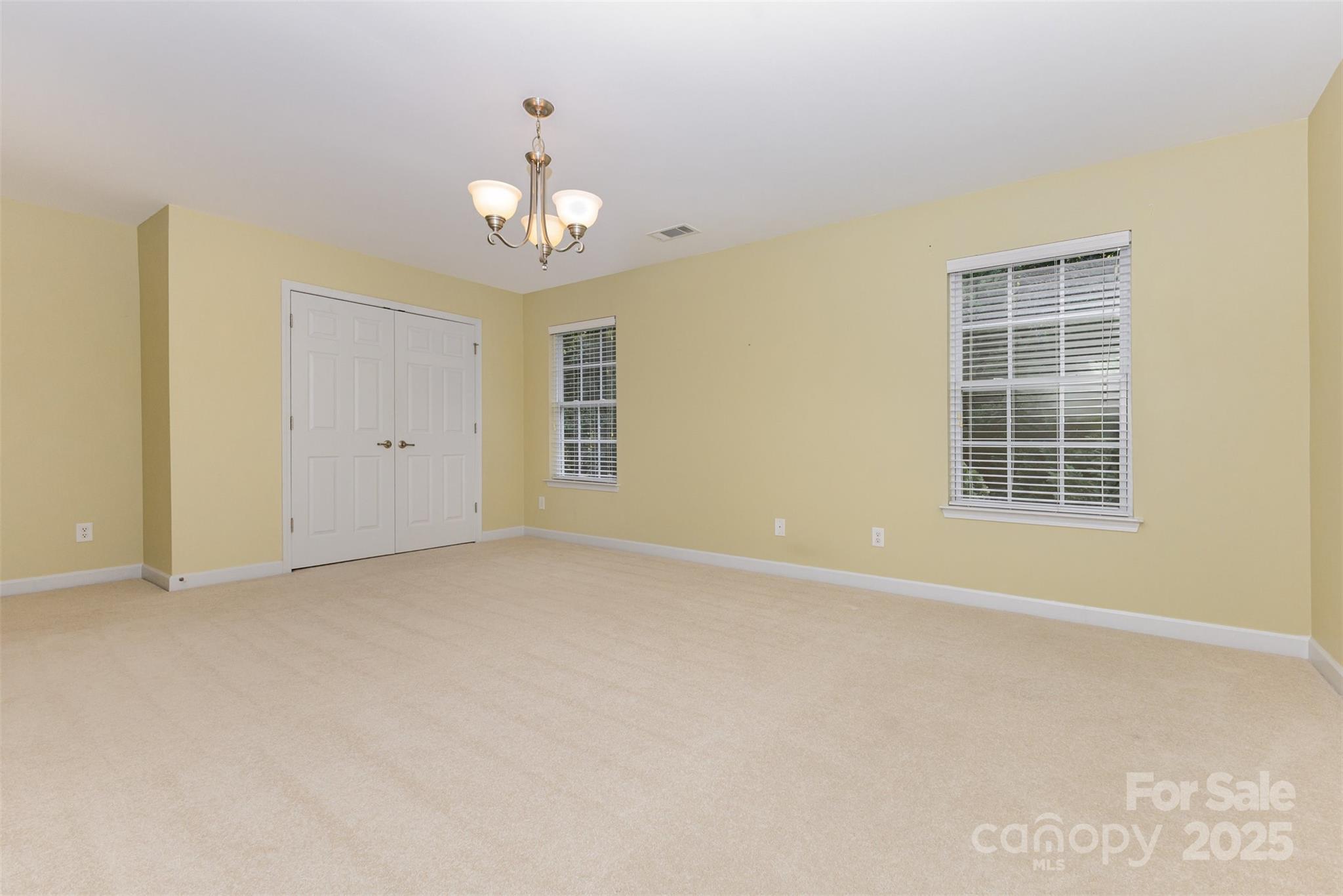 445 Buttermere Road Fort Mill, SC 29715 - Photo 20 of 42 a view of an empty room with a window
