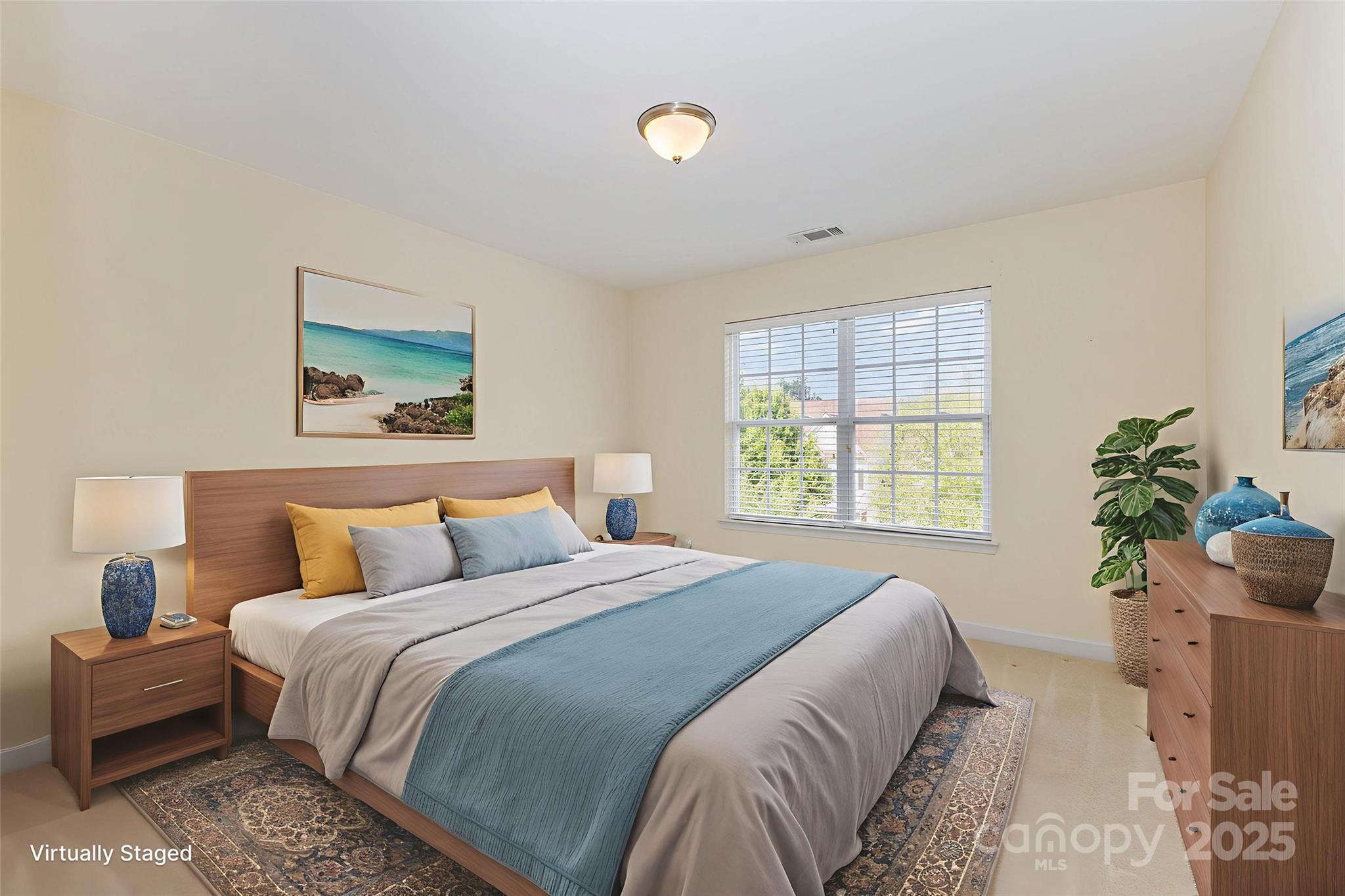 445 Buttermere Road Fort Mill, SC 29715 - Photo 22 of 35 a bedroom with a bed and a potted plant