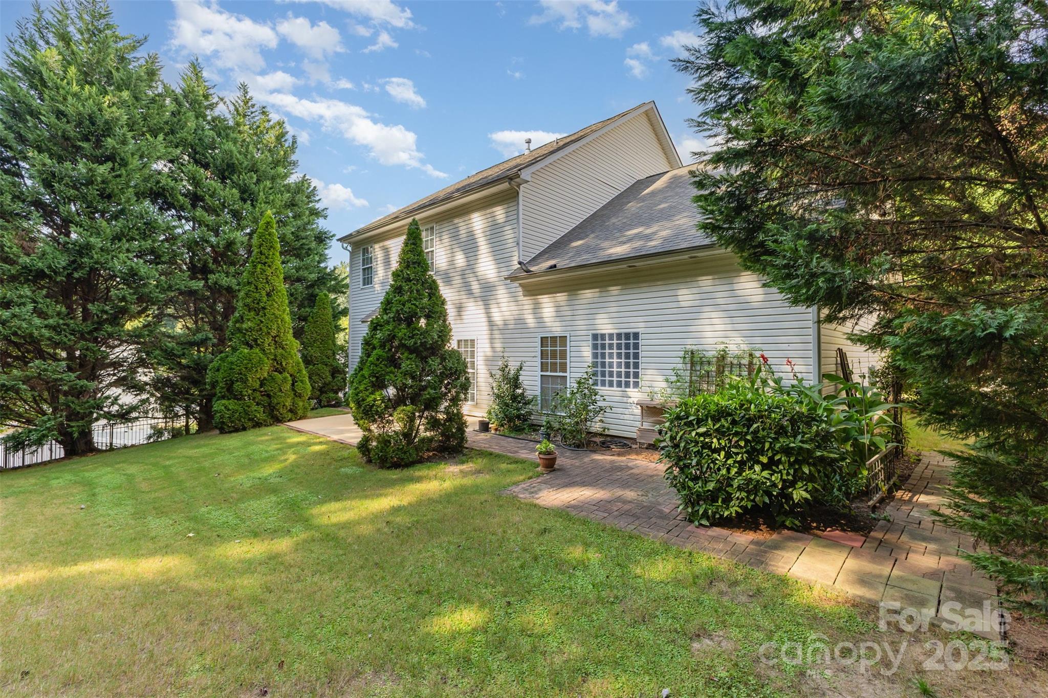 445 Buttermere Road Fort Mill, SC 29715 - Photo 28 of 35 a view of a house with backyard