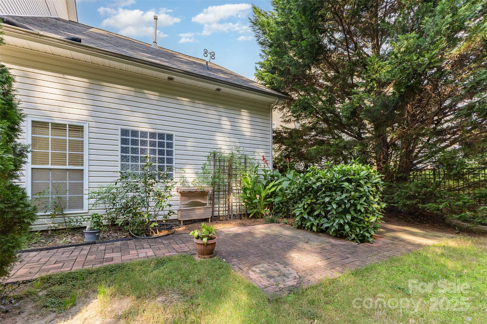 445 Buttermere Road Fort Mill, SC 29715 - Photo 29 of 35 a view of backyard of house with green space