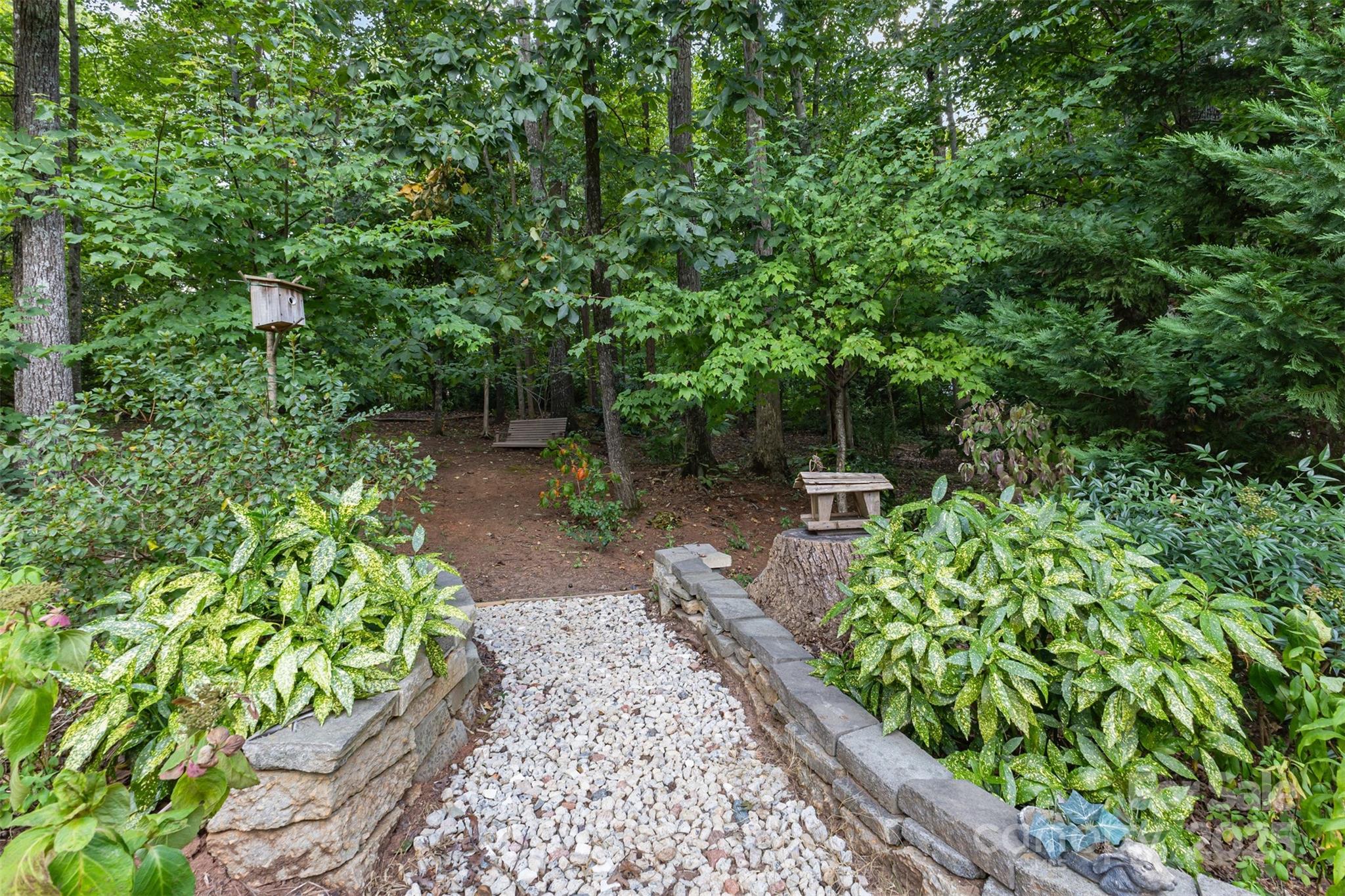 445 Buttermere Road Fort Mill, SC 29715 - Photo 31 of 35 a backyard of a house with lots of green space