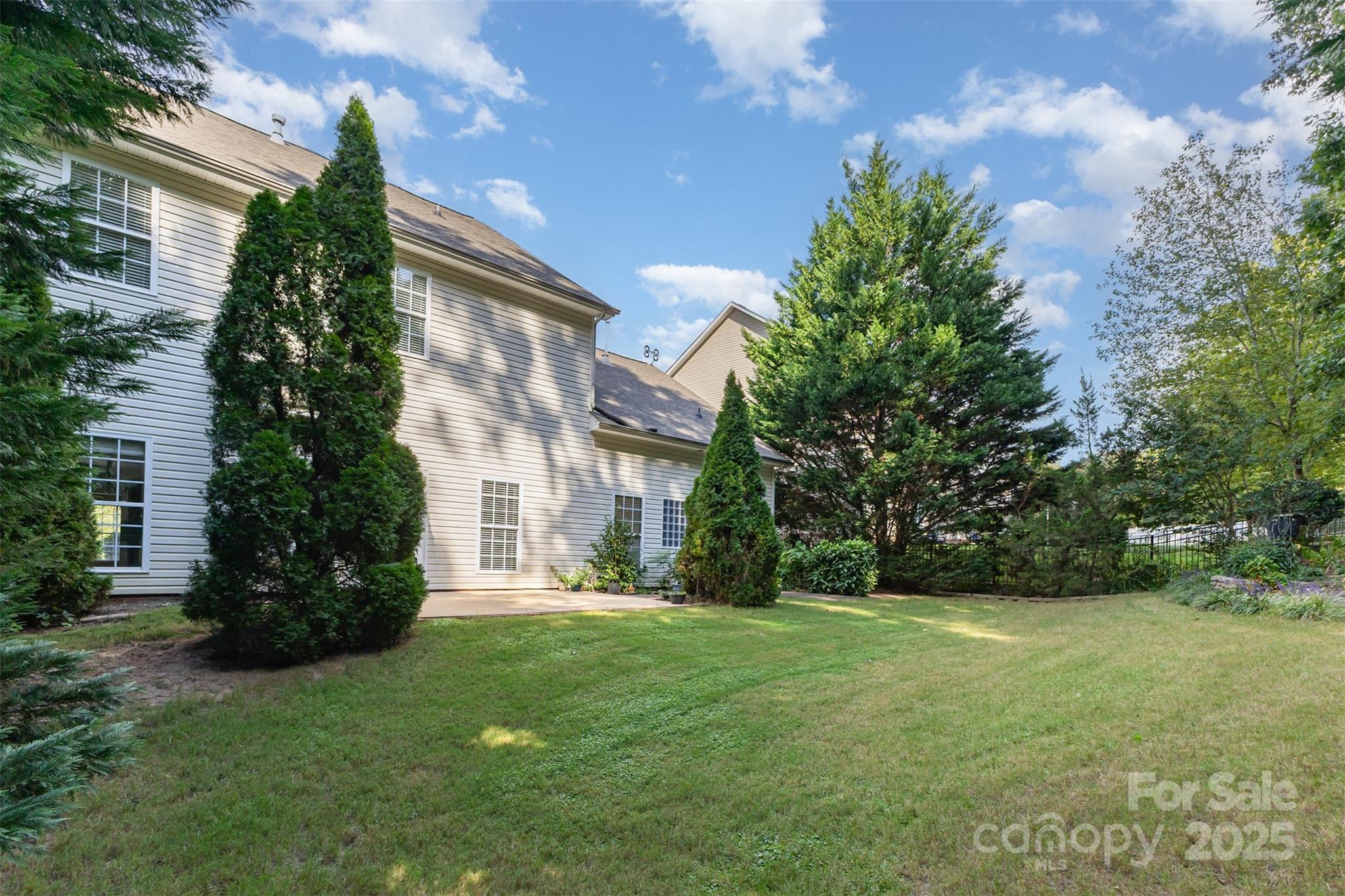 445 Buttermere Road Fort Mill, SC 29715 - Photo 33 of 42 a view of a house with backyard