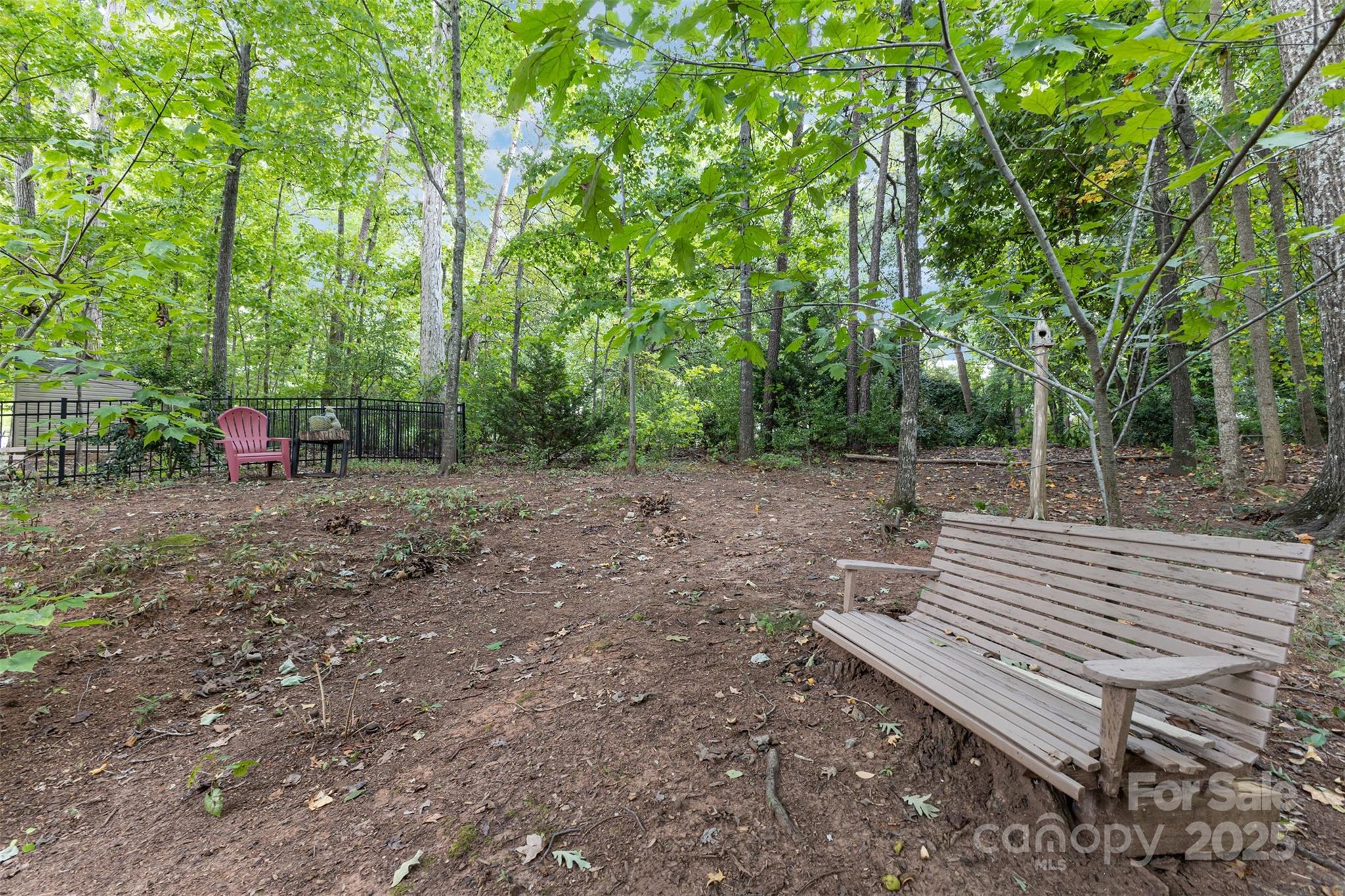 445 Buttermere Road Fort Mill, SC 29715 - Photo 36 of 42 a view of a bench in a backyard