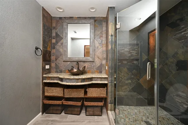 a view of yard with swimming pool and green space