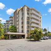 a view of a building with sitting area