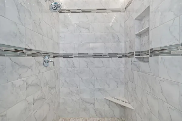 a view of a garden with a house in the background