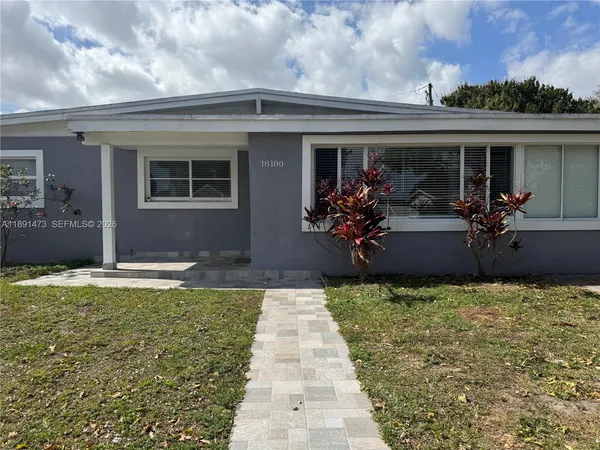 a view of a house with patio