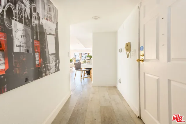 a view of a living room with furniture