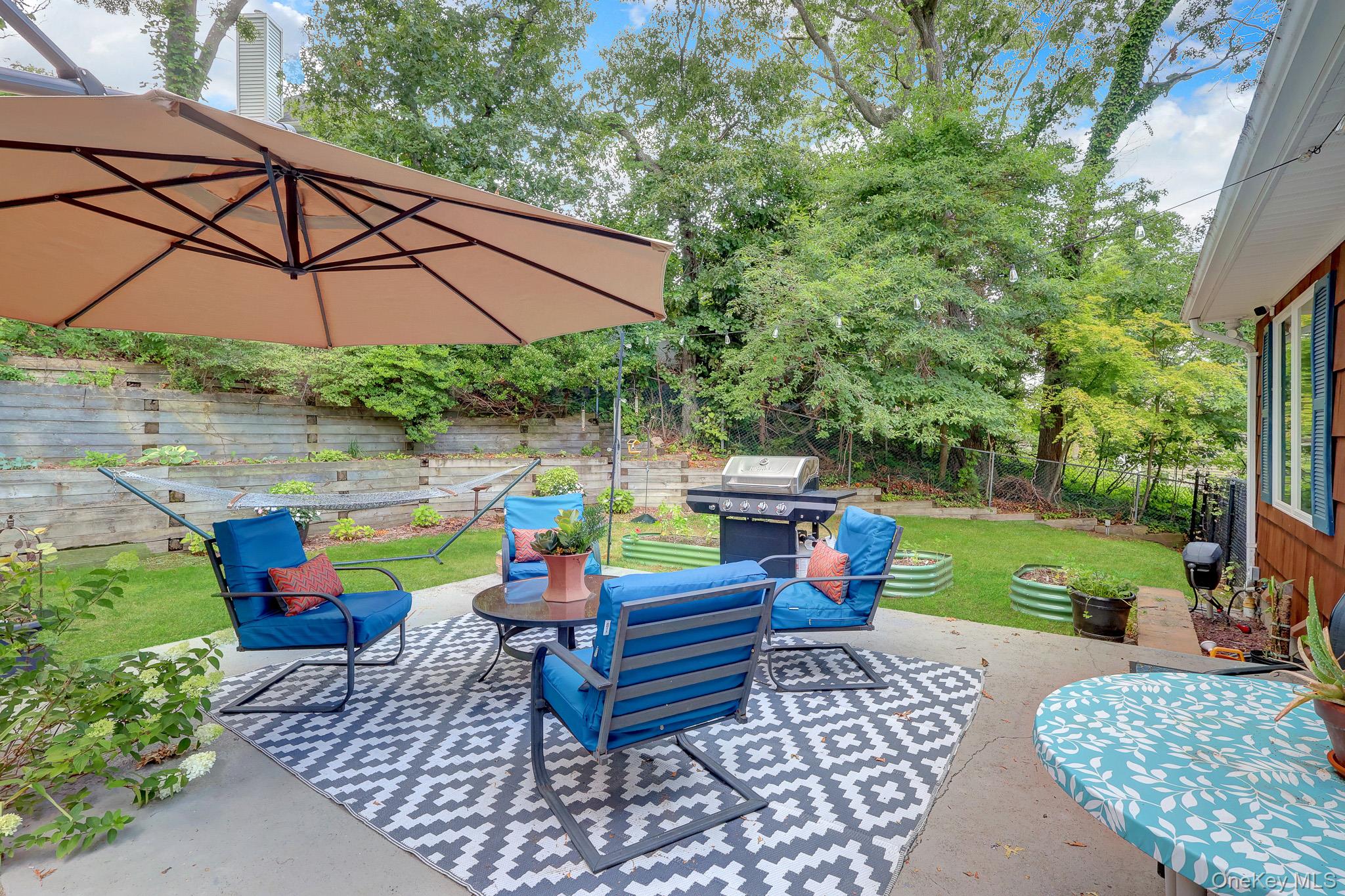 26 Greenlawn Road Sound Beach, NY 11789 - Photo 28 of 32 Backyard Patio Area