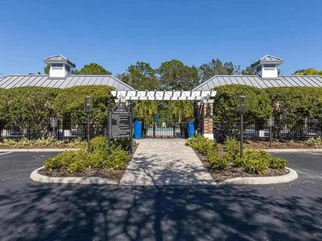 a view of a street with a sign board