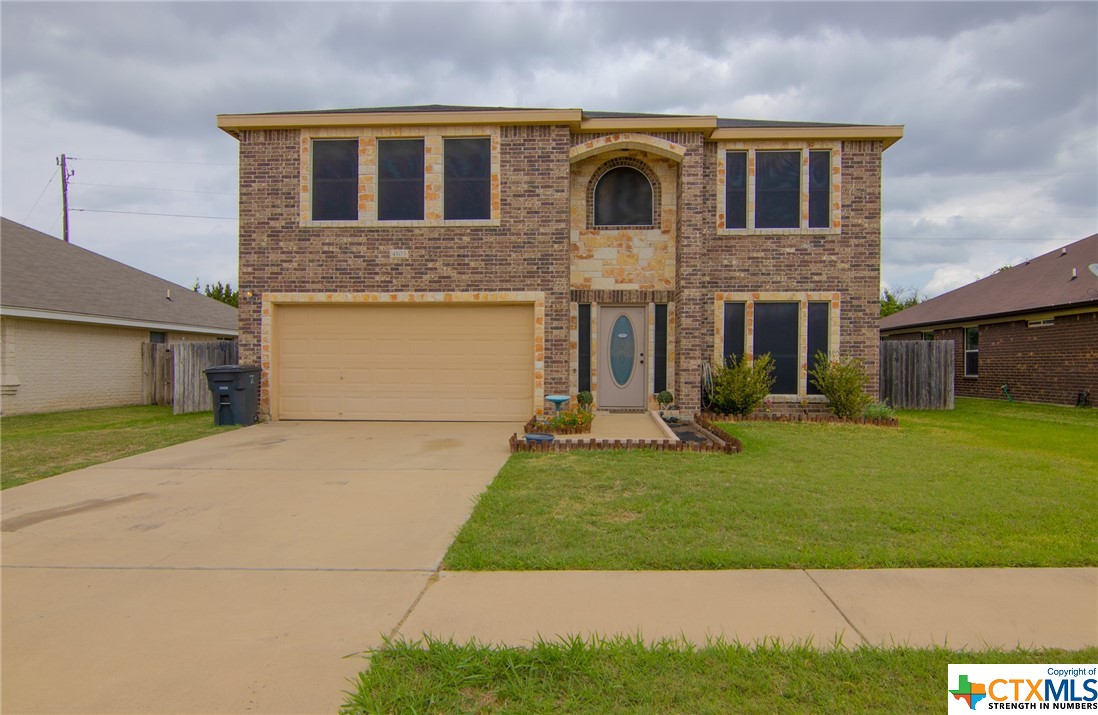 4103 Dewitt County Court Killeen, TX 76549 - Photo 1 of 1 a front view of a house with a yard