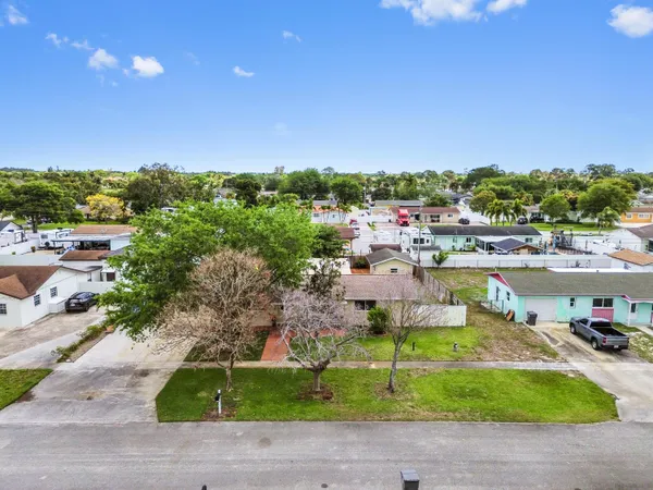 $699,900 | 1560 Roy Drive, West Palm Beach, FL 33415