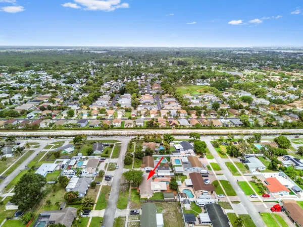$699,900 | 1560 Roy Drive, West Palm Beach, FL 33415