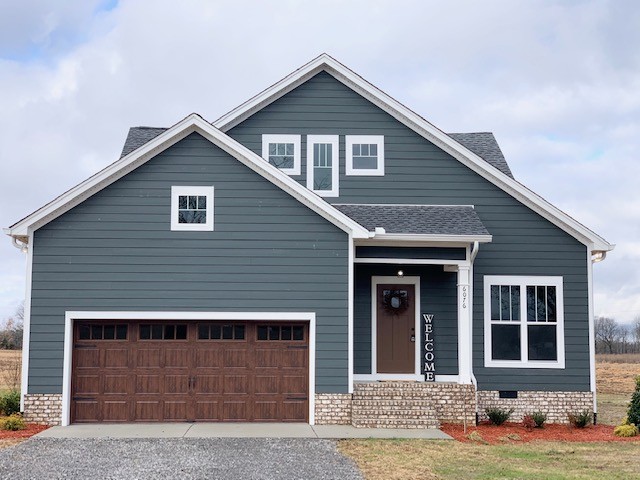 6076 Brown Road Springfield, TN 37172 - Photo 1 of 17 a front view of a house with a yard