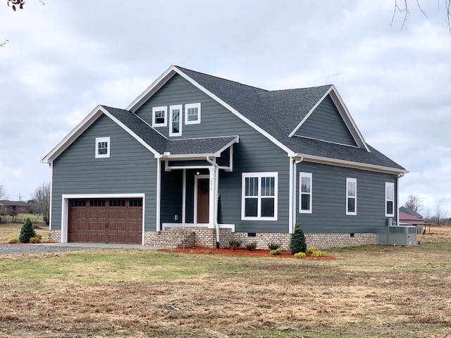 6076 Brown Road Springfield, TN 37172 - Photo 2 of 17 a front view of a house with a yard