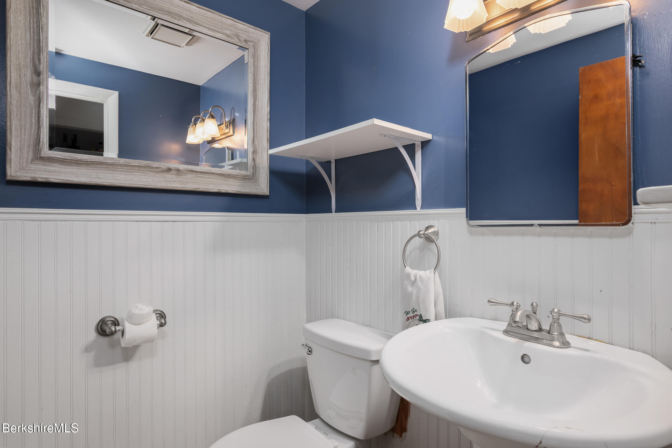 310 Luce Road Williamstown, MA 01267 - Photo 19 of 30 a bathroom with a toilet sink and mirror