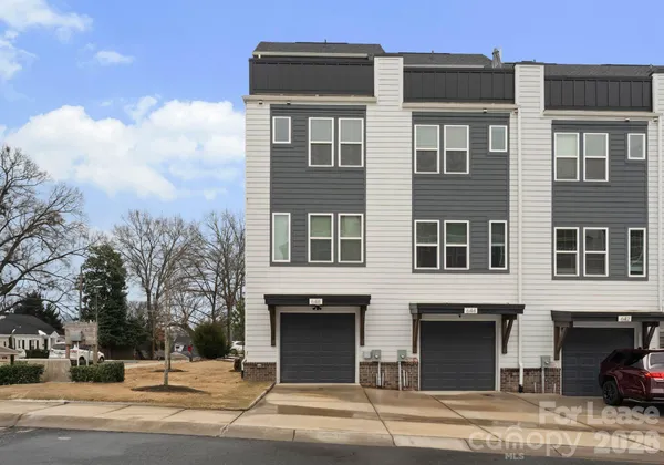 a view of a building with a street