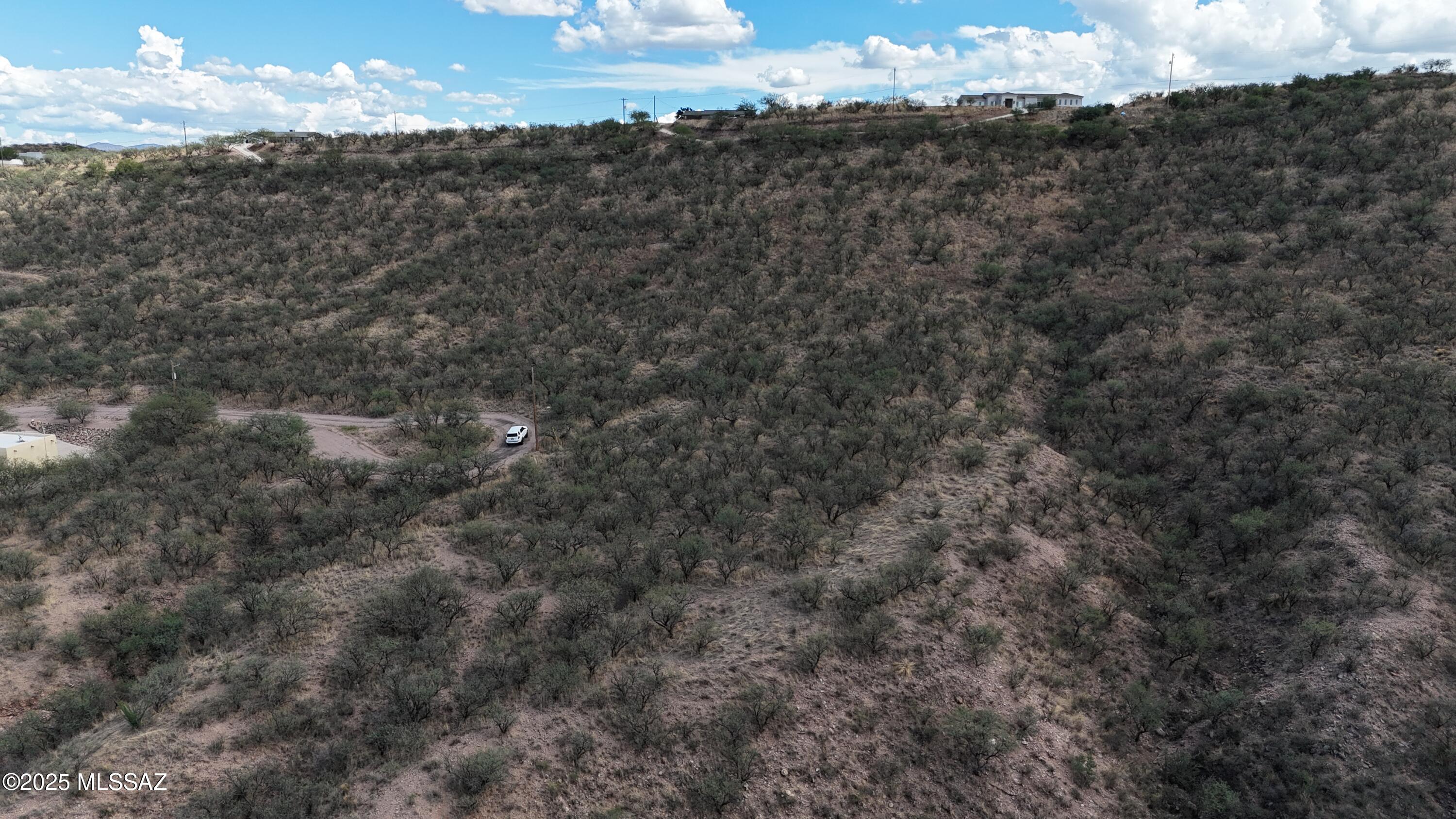 1366 Esta Court, Unit 29 Rio Rico, AZ 85648 - Photo 5 of 10 a view of a sky view of mountains