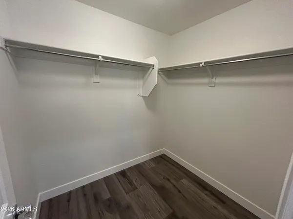 a view of an empty walk in closet