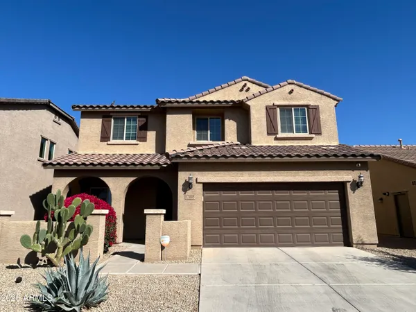 a view of a house with a garage