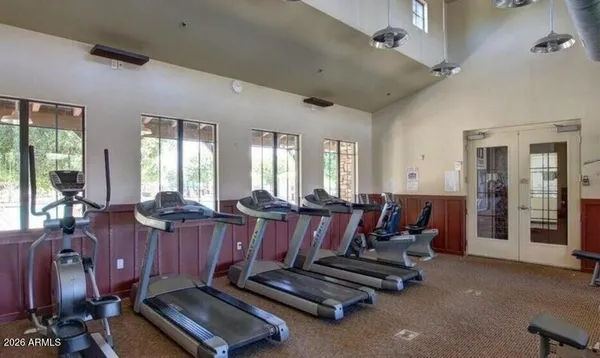 a view of a swimming pool with a patio