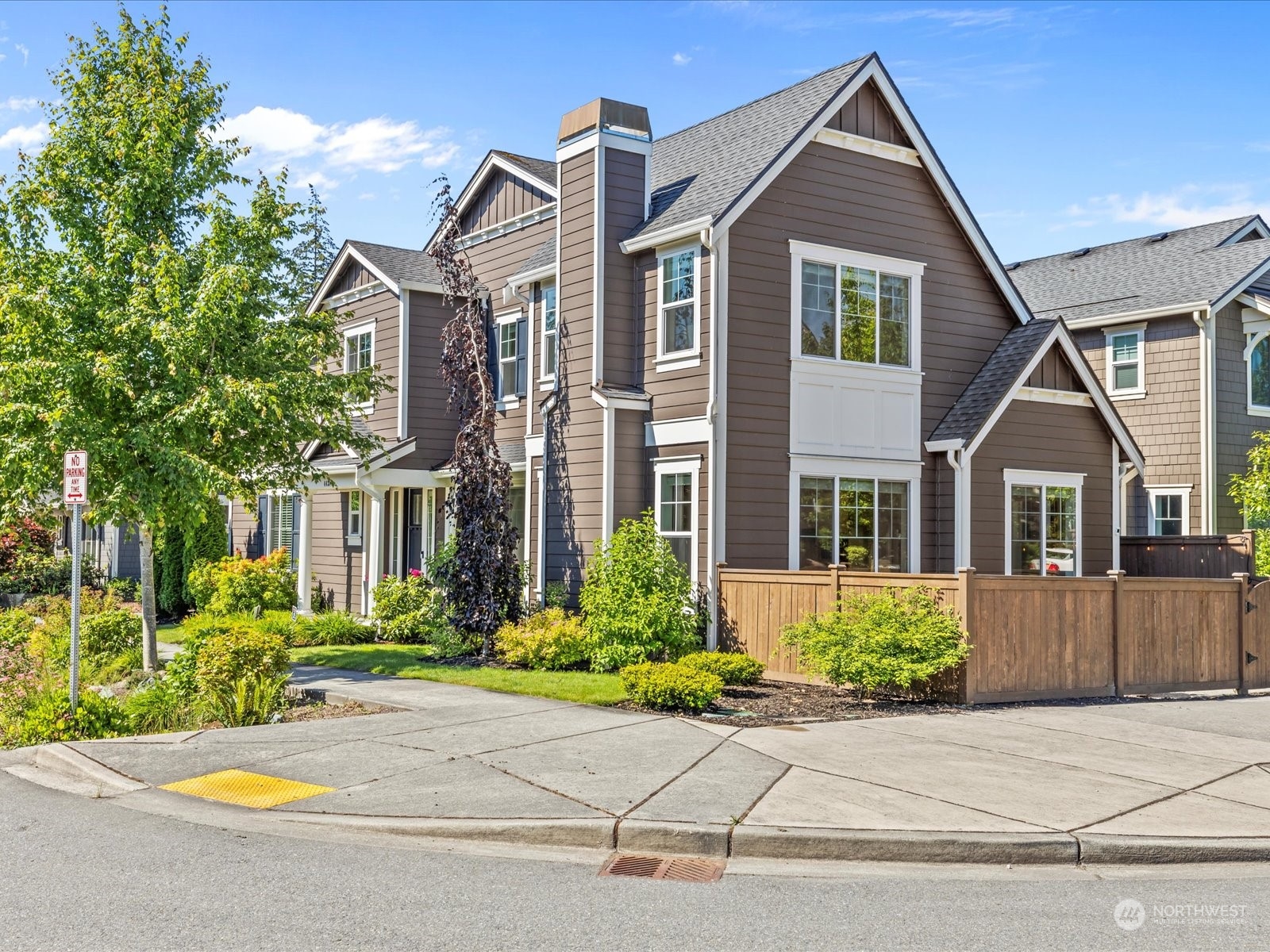 4431 187th Street Southeast Bothell, WA 98012 - Photo 2 of 39 a front view of a house with a yard and potted plants