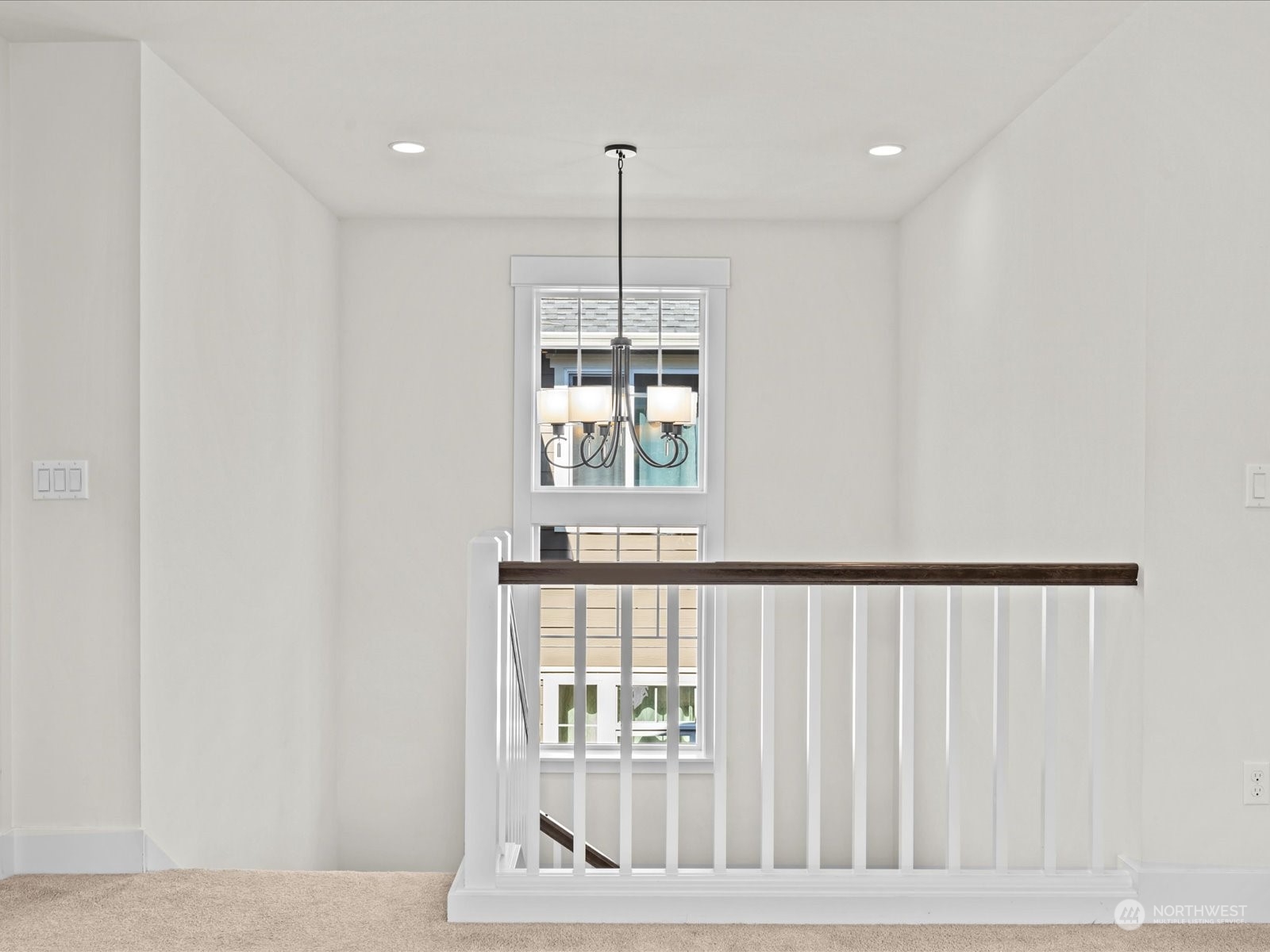 4431 187th Street Southeast Bothell, WA 98012 - Photo 22 of 39 a view of wooden floor and a window in a room