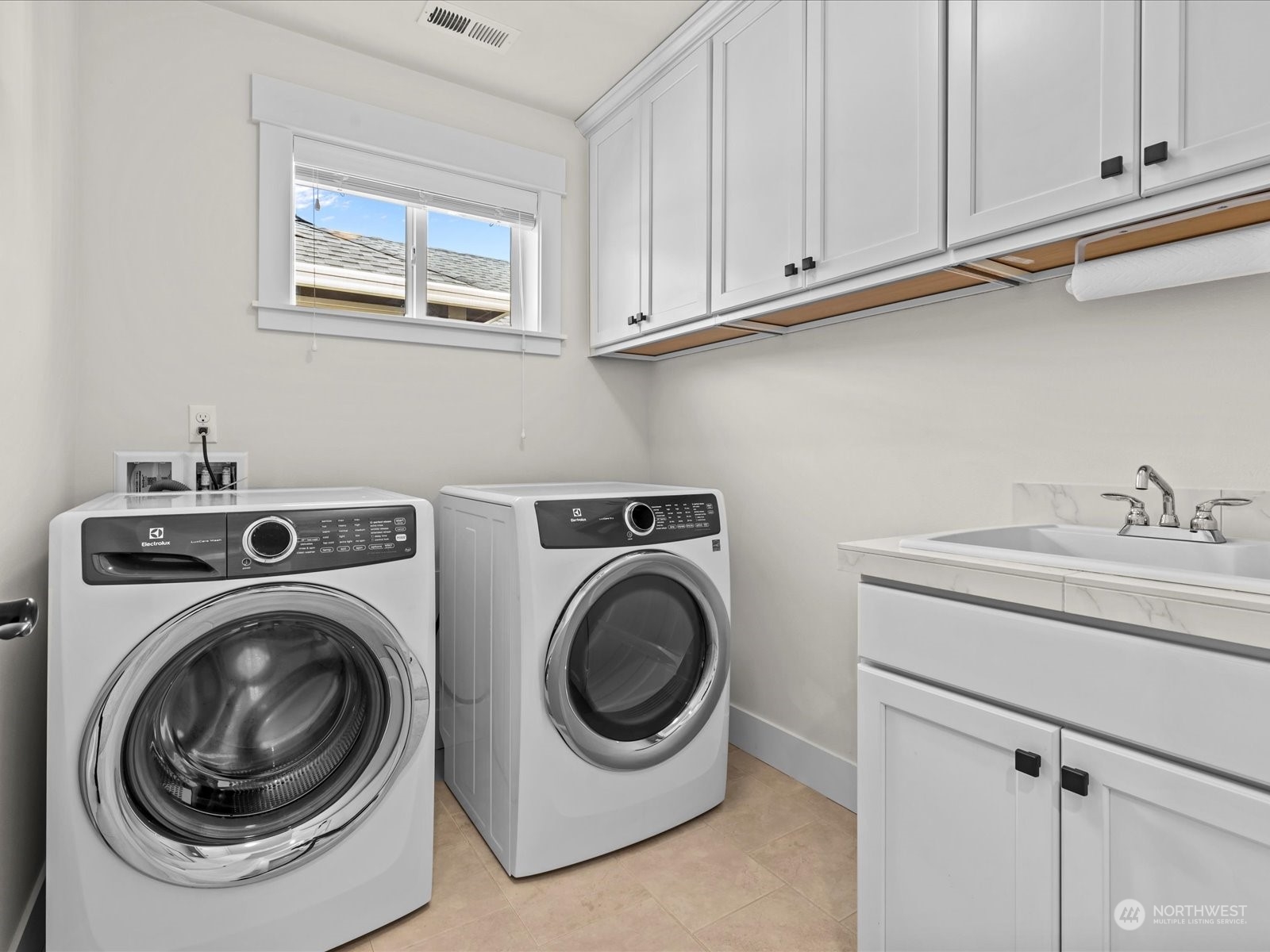 4431 187th Street Southeast Bothell, WA 98012 - Photo 25 of 39 a utility room with dryer and washer
