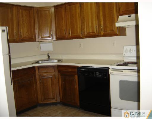2015 Aspen Drive Plainsboro, NJ 08536 - Photo 2 of 7 a kitchen with a sink and cabinets