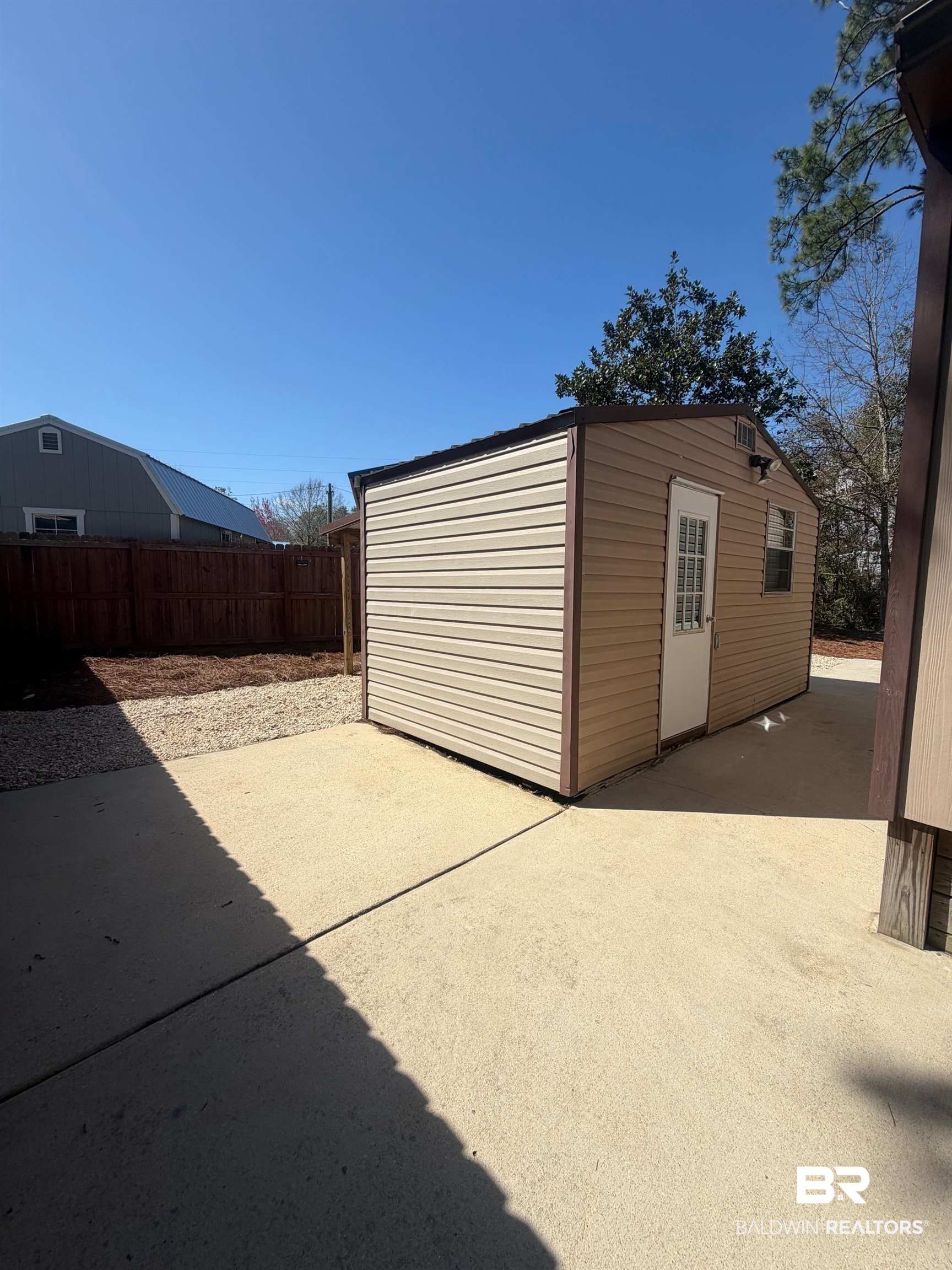 685 Escambia Loop Lillian, AL 36549 - Photo 22 of 43 View of garage