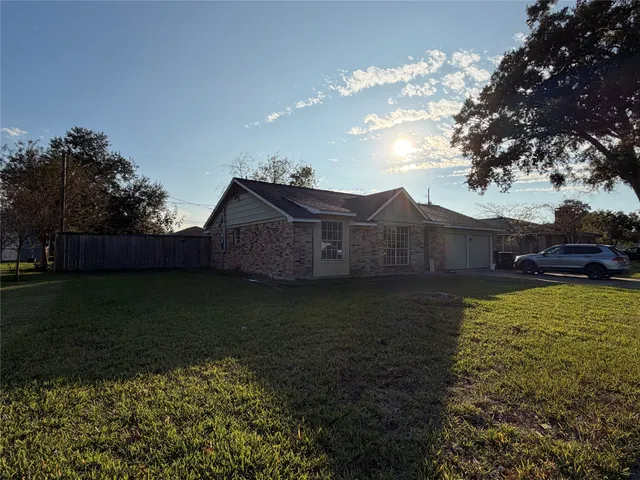 a house view with a garden space