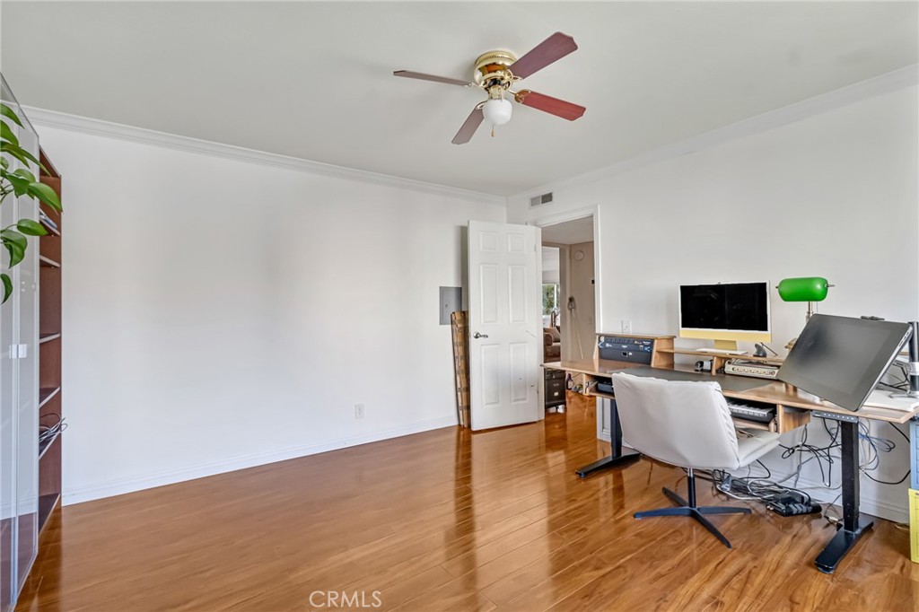 601 East Orange Grove Avenue, Unit 106 Burbank, CA 91501 - Photo 13 of 27 a view of a workspace with furniture and a window
