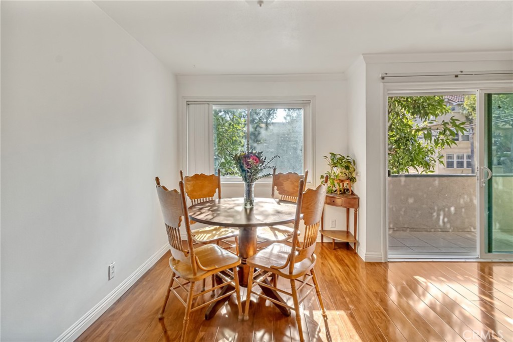 601 East Orange Grove Avenue, Unit 106 Burbank, CA 91501 - Photo 17 of 27 a view of a dining room with furniture window and outside view