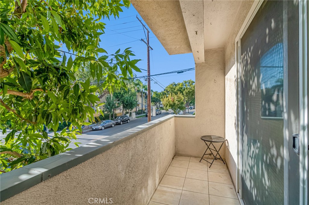 601 East Orange Grove Avenue, Unit 106 Burbank, CA 91501 - Photo 21 of 27 a bathroom with a toilet and a shower