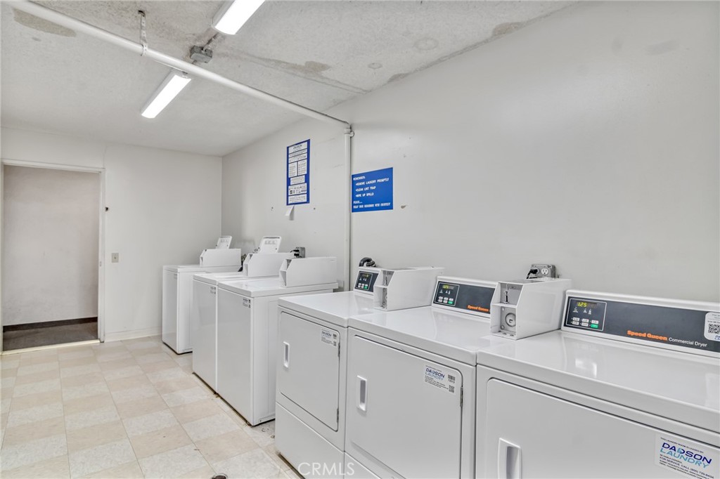 601 East Orange Grove Avenue, Unit 106 Burbank, CA 91501 - Photo 7 of 27 a bathroom with a sink and a mirror