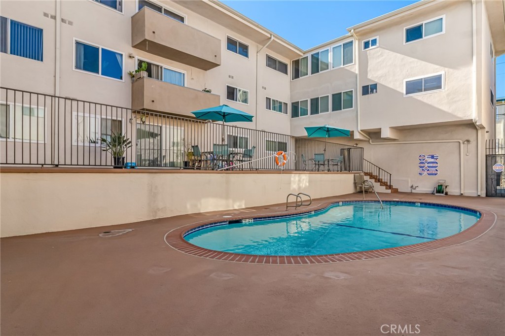 601 East Orange Grove Avenue, Unit 106 Burbank, CA 91501 - Photo 10 of 27 a view of a patio with a yard