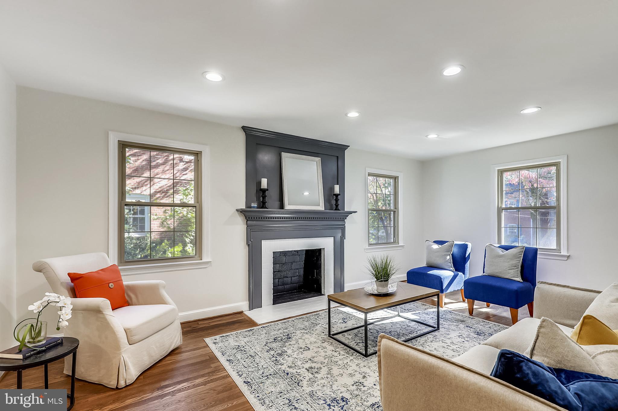 303 Penwood Road Silver Spring, MD 20901 - Photo 11 of 44 Formal Living Room with Wood Burning Fireplace