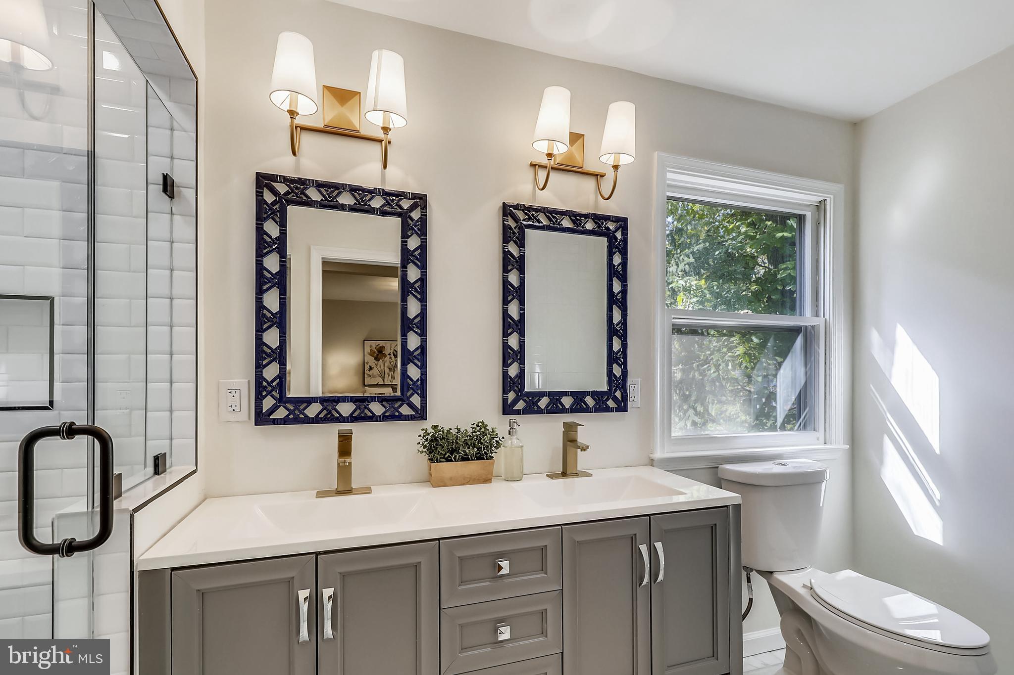 303 Penwood Road Silver Spring, MD 20901 - Photo 18 of 44 Double Vanity in Primary Bathroom