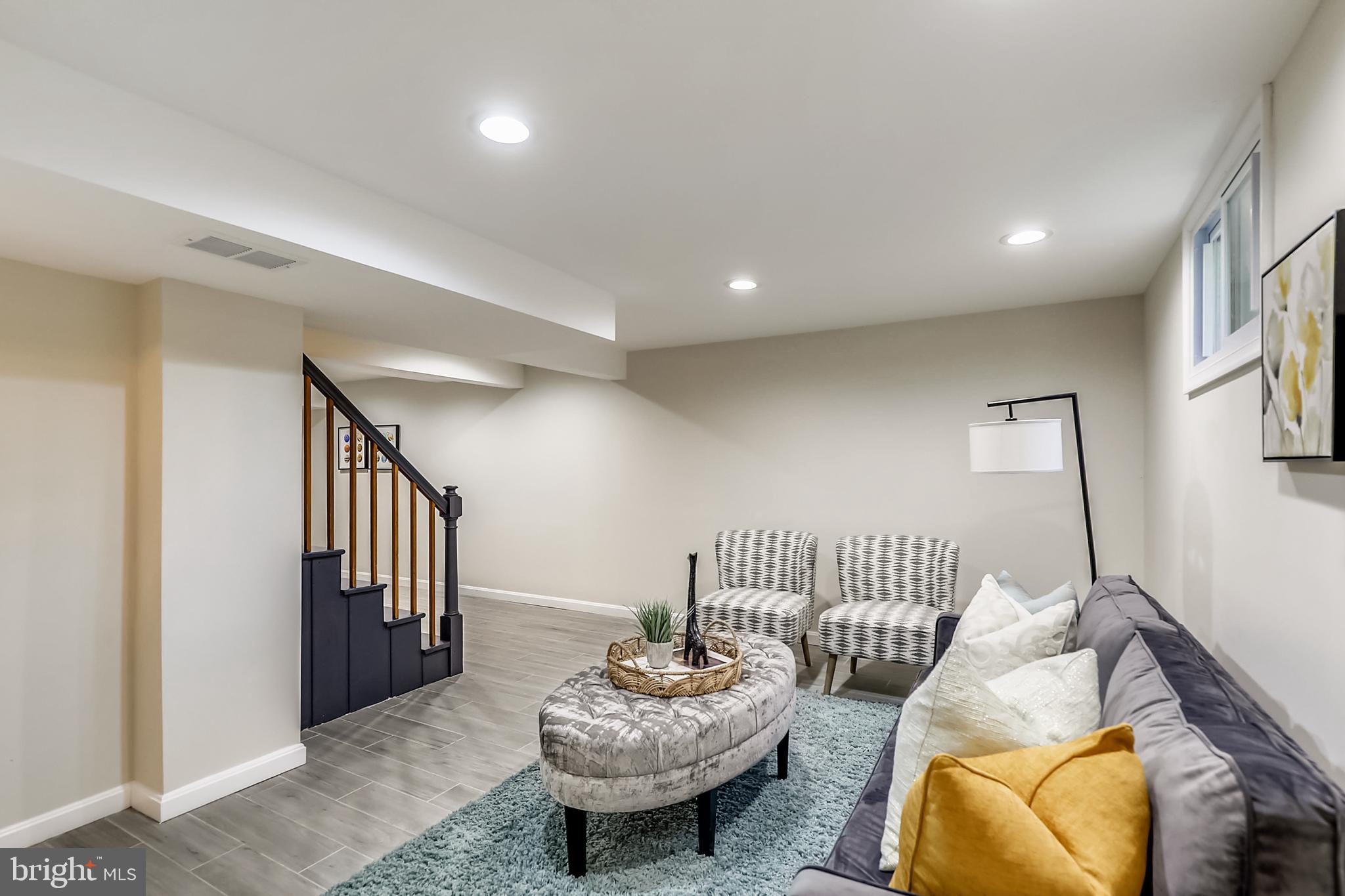 303 Penwood Road Silver Spring, MD 20901 - Photo 29 of 44 Finished Basement with Tile Flooring