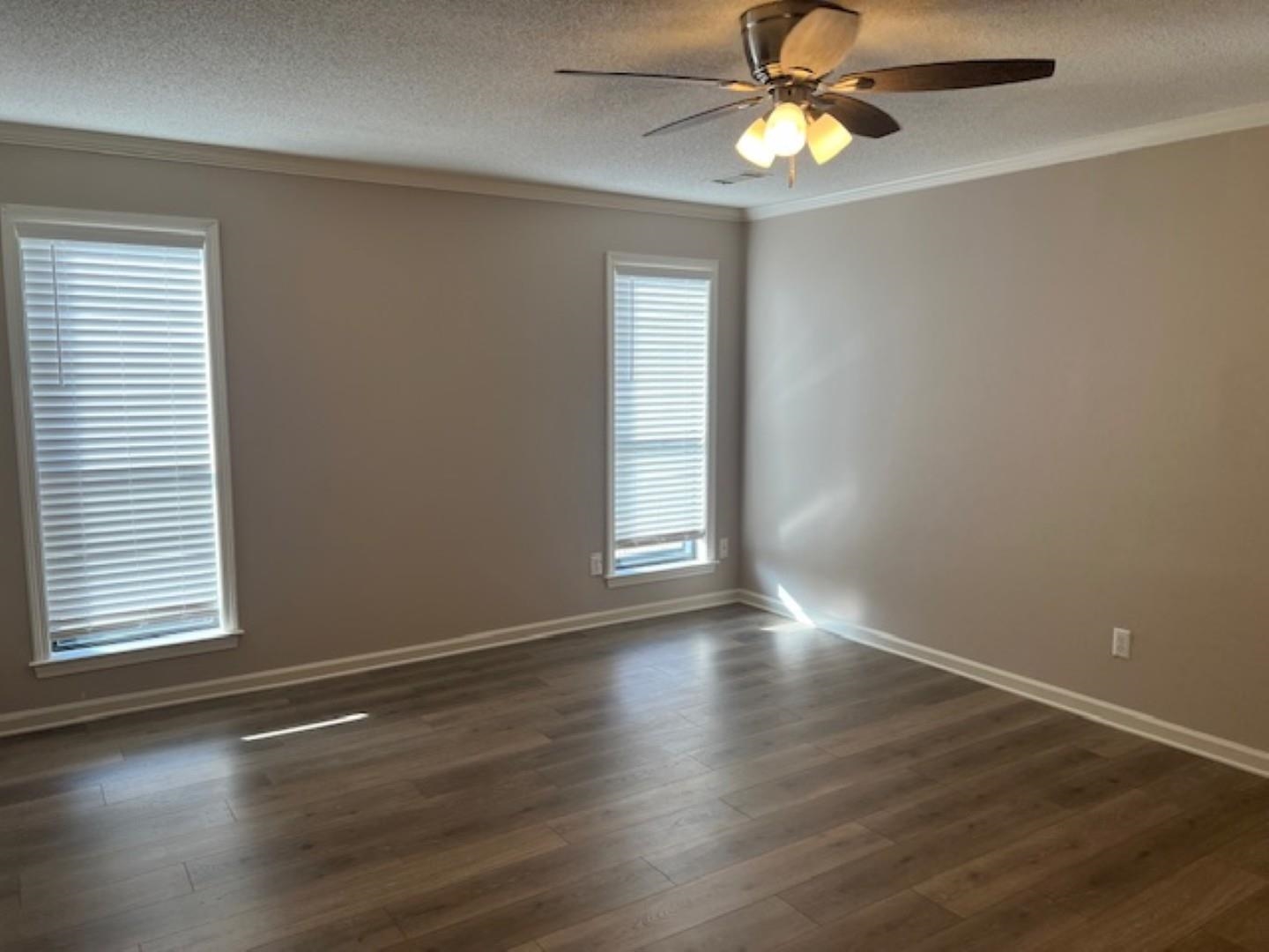 290 Rose Trellis Road Collierville, TN 38017 - Photo 12 of 17 a view of wooden floor and chandelier fan in a room