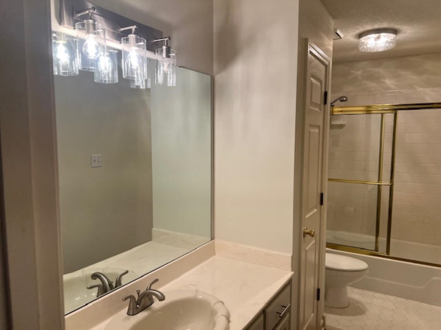 290 Rose Trellis Road Collierville, TN 38017 - Photo 14 of 17 a bathroom with a sink and mirror