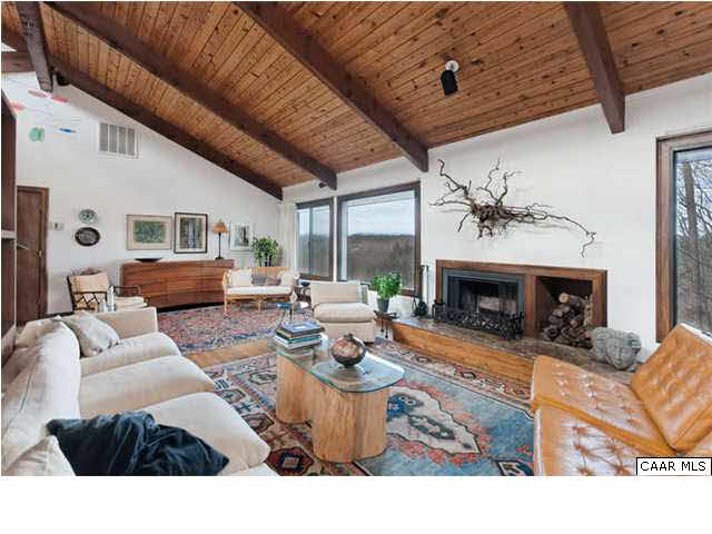 1747 Lambs Road Charlottesville, VA 22901 - Photo 6 of 24 a living room with furniture and a fireplace
