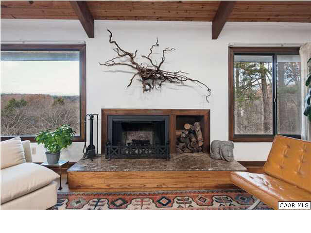 1747 Lambs Road Charlottesville, VA 22901 - Photo 7 of 24 a living room with furniture and a fireplace