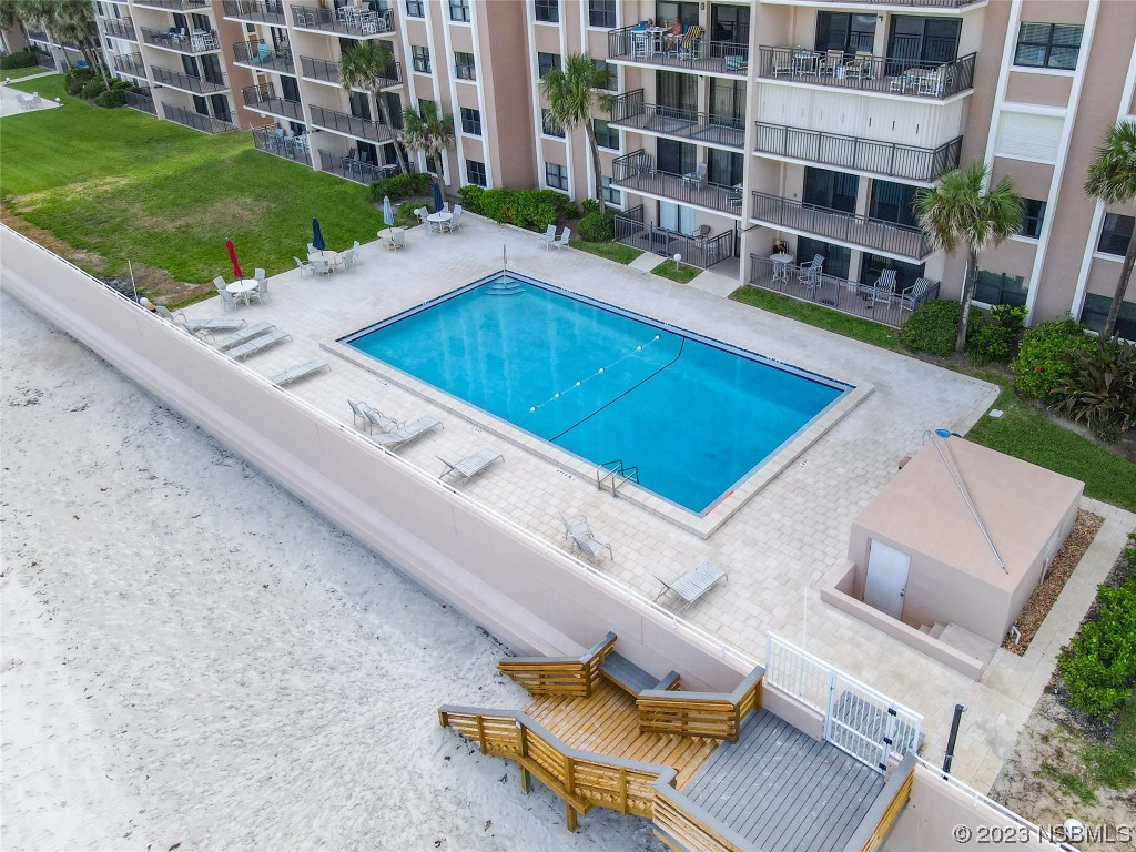 4435 South Atlantic Avenue, Unit 311 Ponce Inlet, FL 32127 - Photo 38 of 44 a view of backyard with outdoor space and seating area